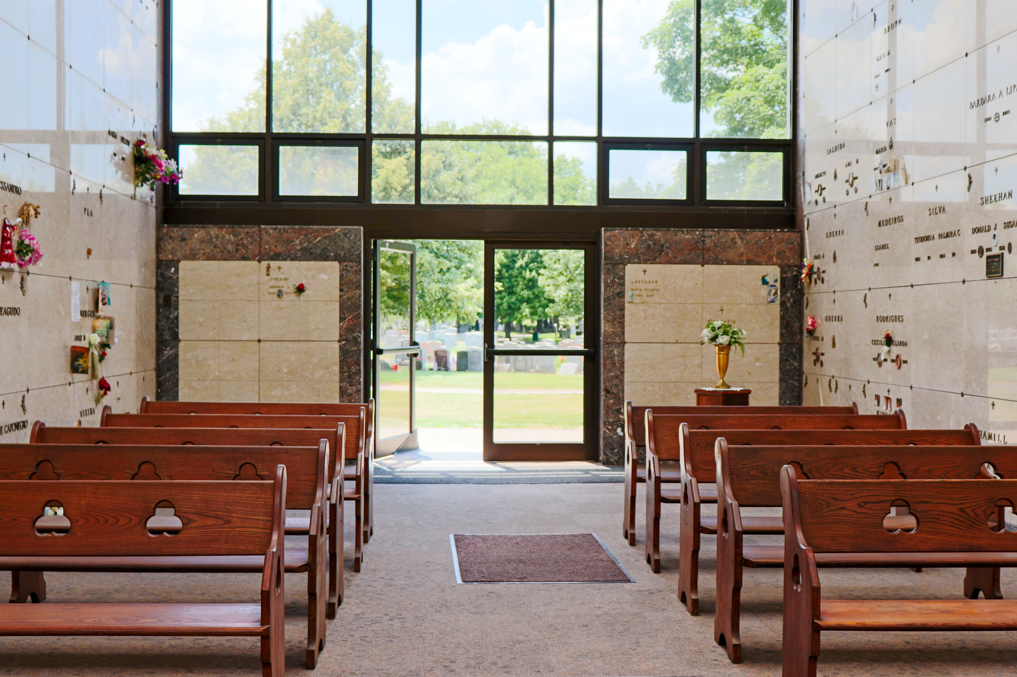 Mount Olivet Cemetery Chapel pews and view towards cemetery
