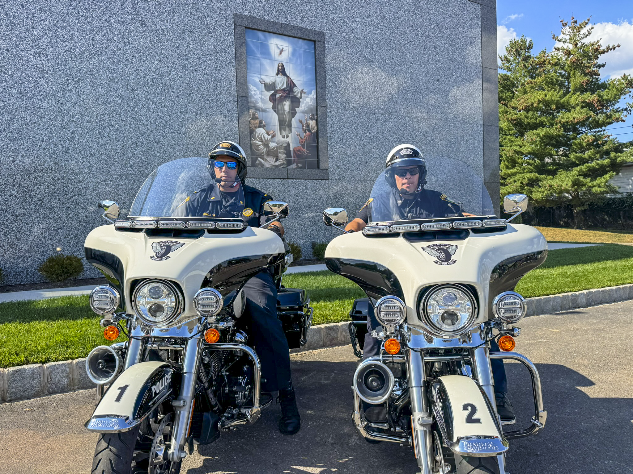 Lieutenant Anthony Scala and Patrolman Matthew Konieczny demonstrate the new Harleys ONLINE