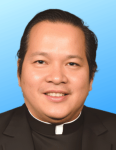 Father Dave NEW 2026 Headshot blue back